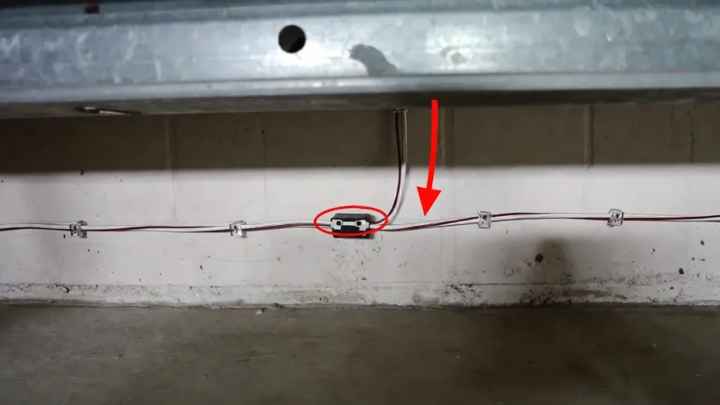  garage door safety sensor wire damage visual check