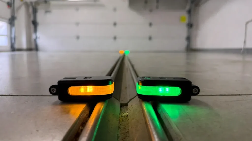 garage door safety sensor lights amber and green