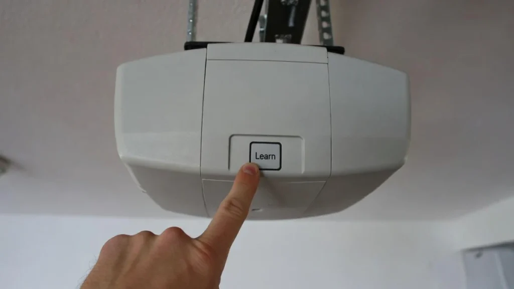press learn button to reprogram garage remote after power outage