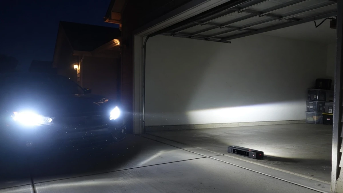 car headlight glare interfering with garage safety sensor at night