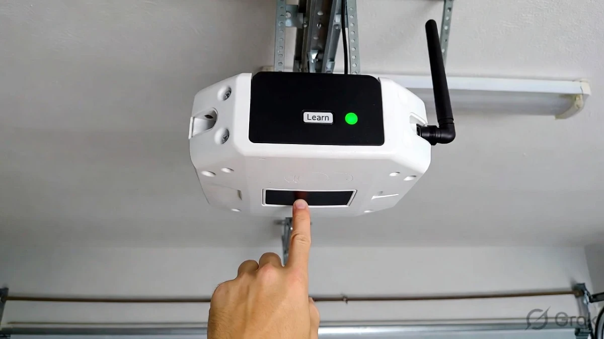 eprogram garage opener learn button to stop random openings
