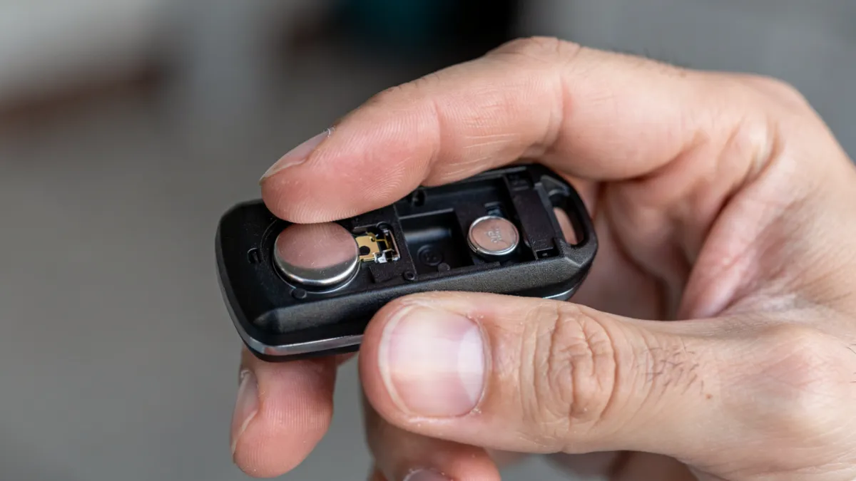 replace remote battery to improve range inside car