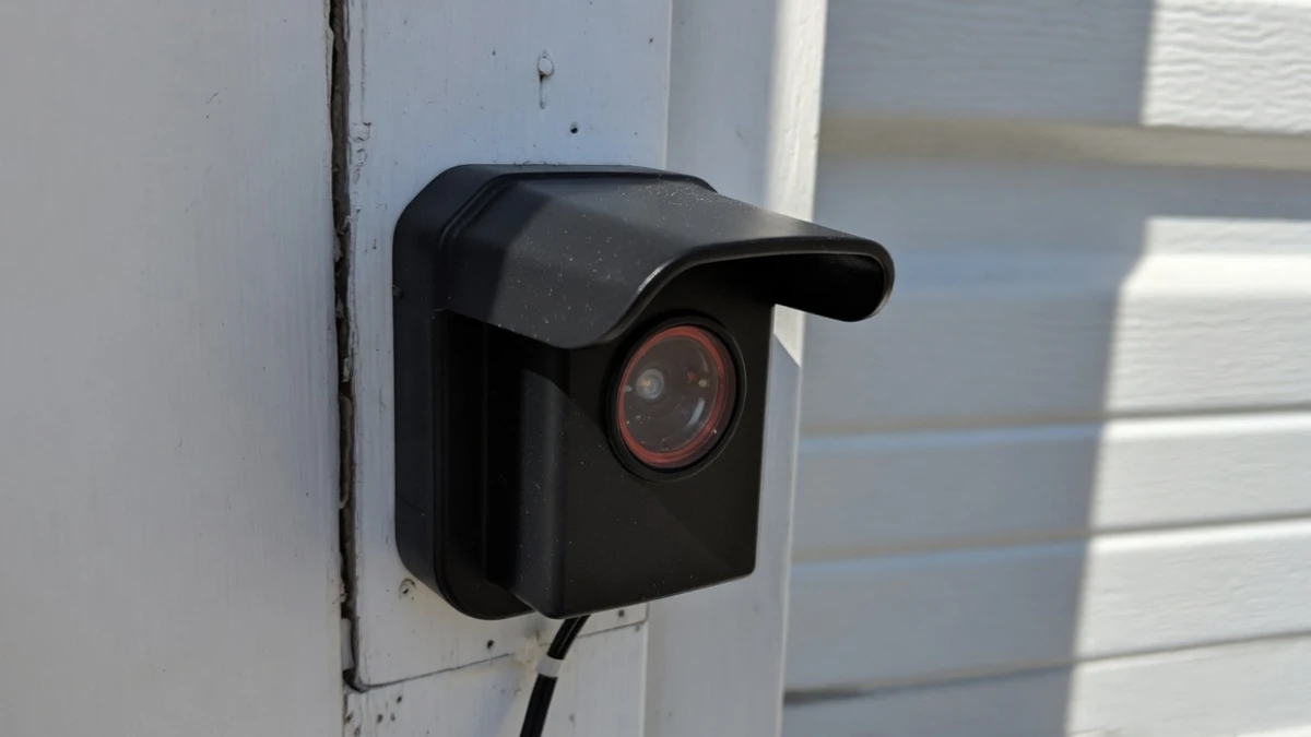 visor shade to stop sunlight or headlight glare on garage sensor